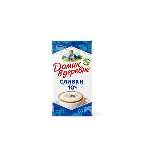 корова